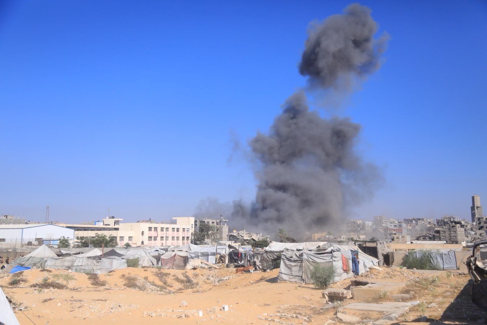 Israeli forces strike Gaza homes and demolish buildings despite truce